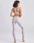 "Move with ease in Leopard Print Yoga Leggings. Pocket for convenience and style. The perfect workout essential!