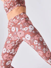 Shop our Pink Floral 7/8-Length Lite Yoga Leggings with front pockets for style, comfort, and functionality. Perfect for yoga and active wear!