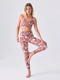 Stay stylish and active with our Pink Floral 7/8-Length Lite Yoga Leggings. Convenient front pockets and soft fabric for ultimate comfort.