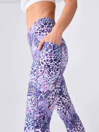 Shop our lightweight yoga leggings with a pink-purple print and front pocket, perfect for comfort and style during every workout.