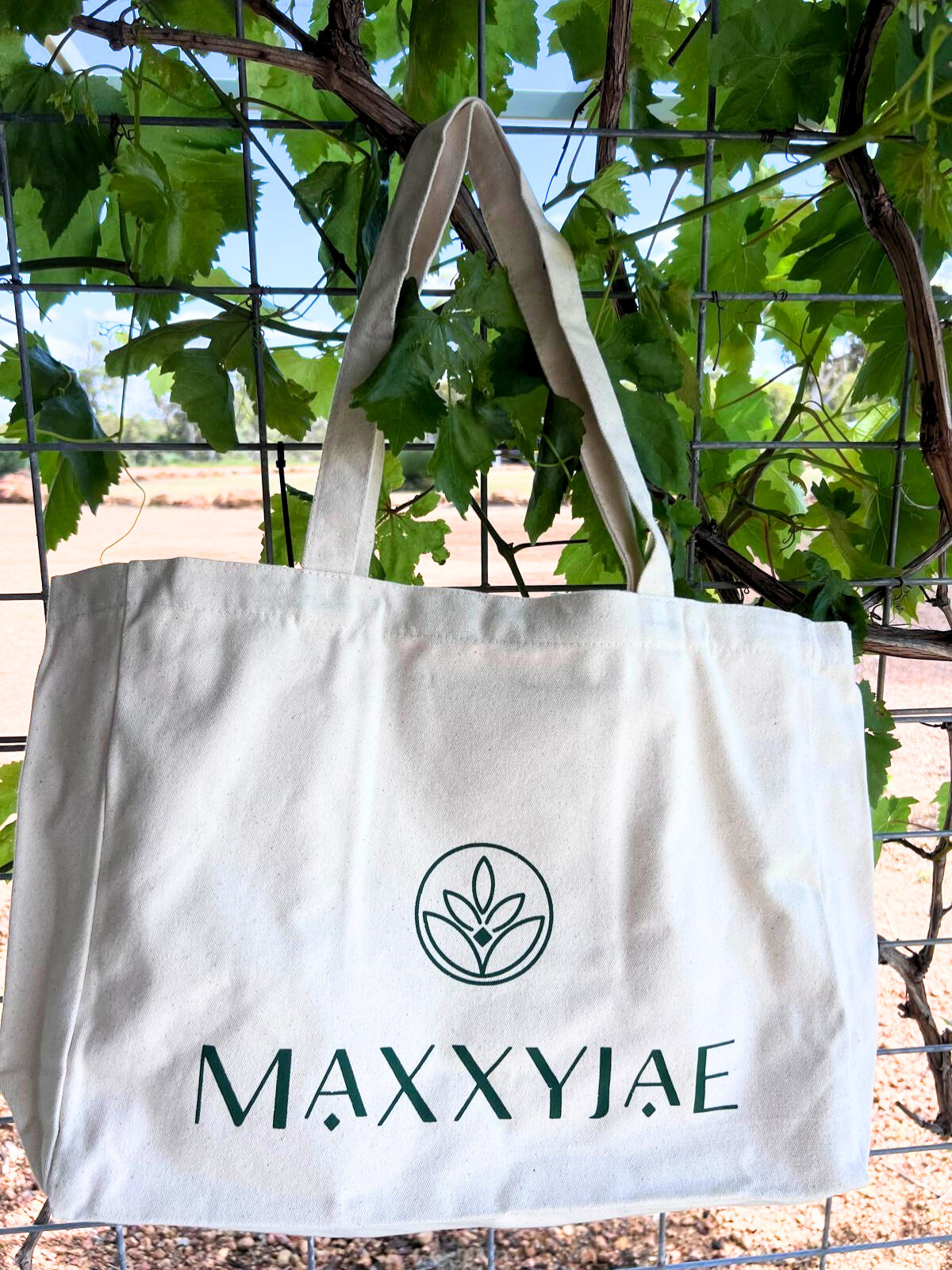 MaxxyJae's cotton tote bag: eco-friendly, durable, and perfect for those who care about style and the planet. Carry it all!