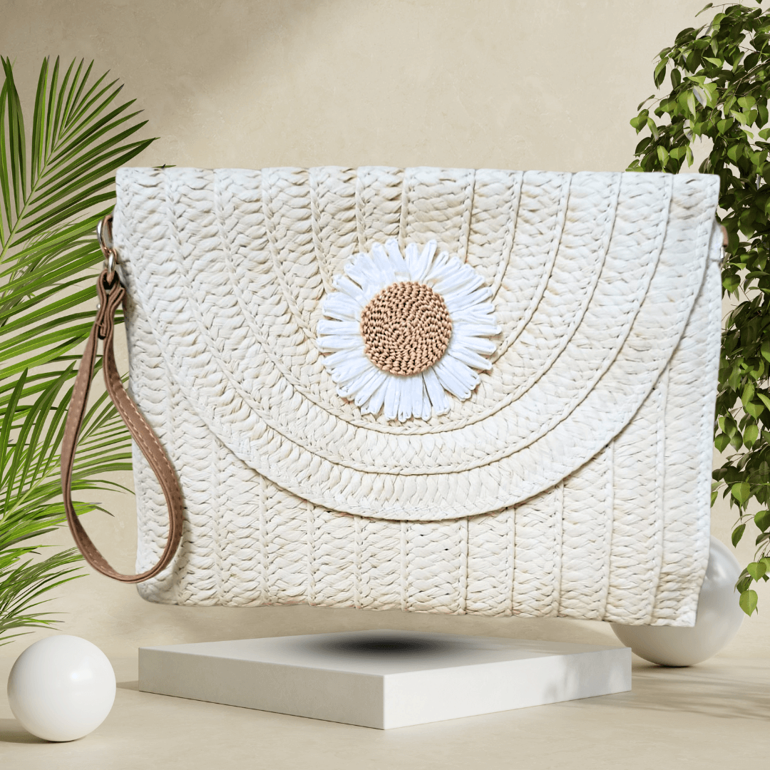 Chic handmade straw clutch bag with a detachable strap, magnetic closure, and eco-friendly design for a stylish, sustainable accessory.