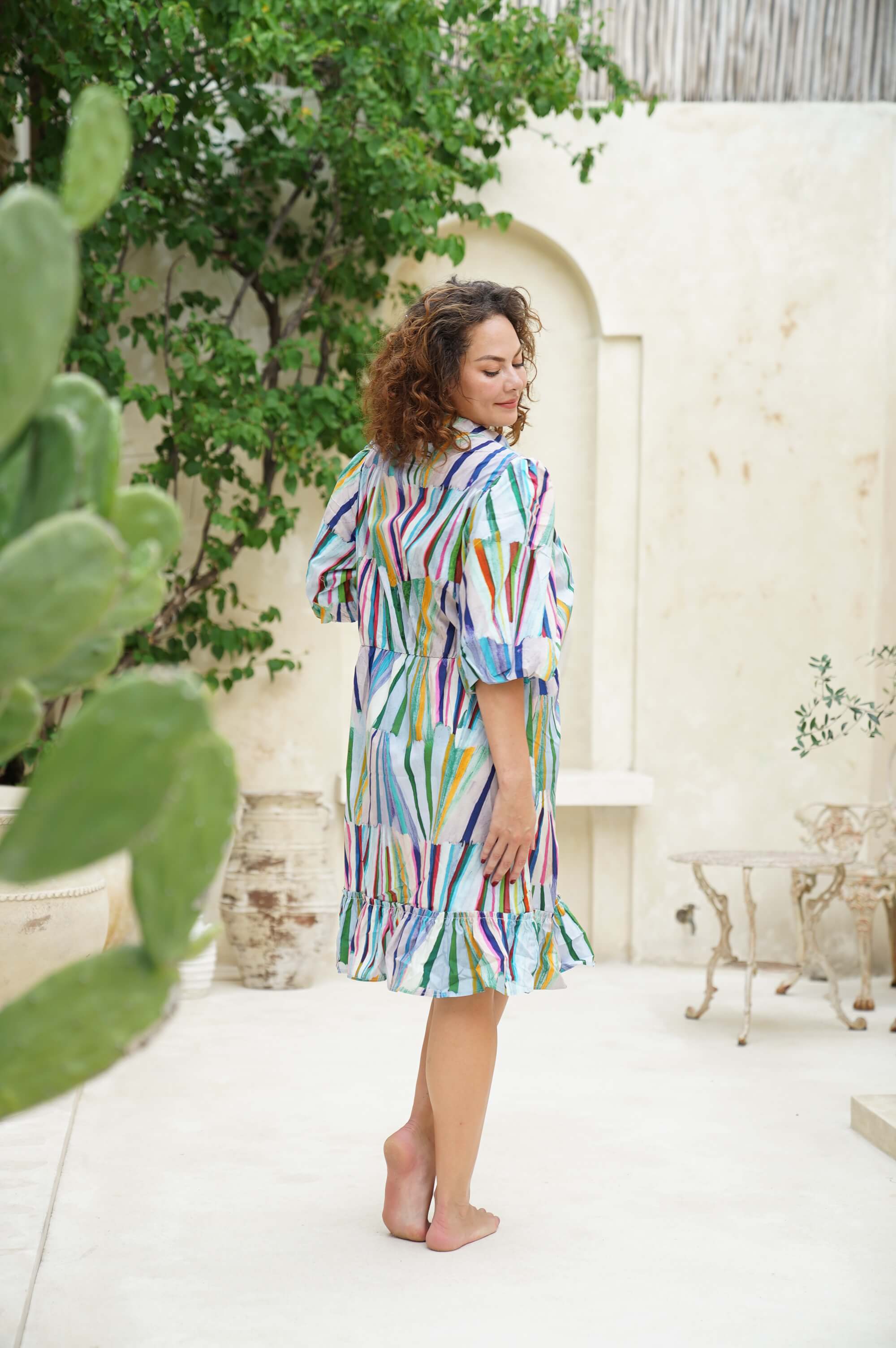Unveil fairy-tale elegance in our Enchanted Forest Midi Dress. Perfect for day or night, this dress enchants with every step. Shop the magic now!