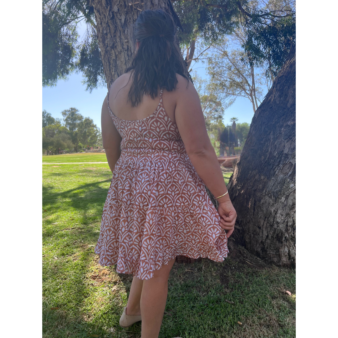 This adjustable-strap cotton summer dress is designed for all-day comfort & timeless style. Get yours now!