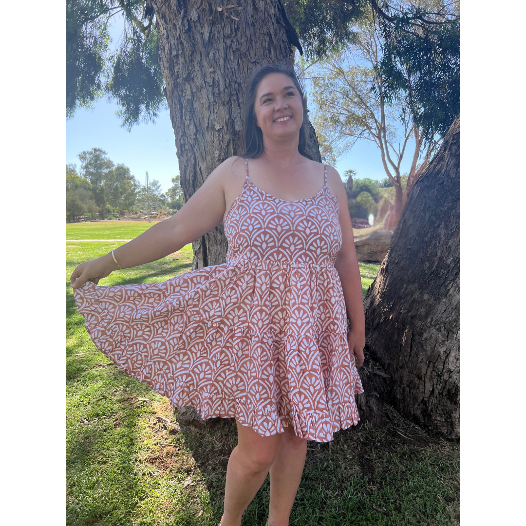 This adjustable-strap cotton summer dress is perfect for effortless style. Feel cool & confident all day long. Shop now!