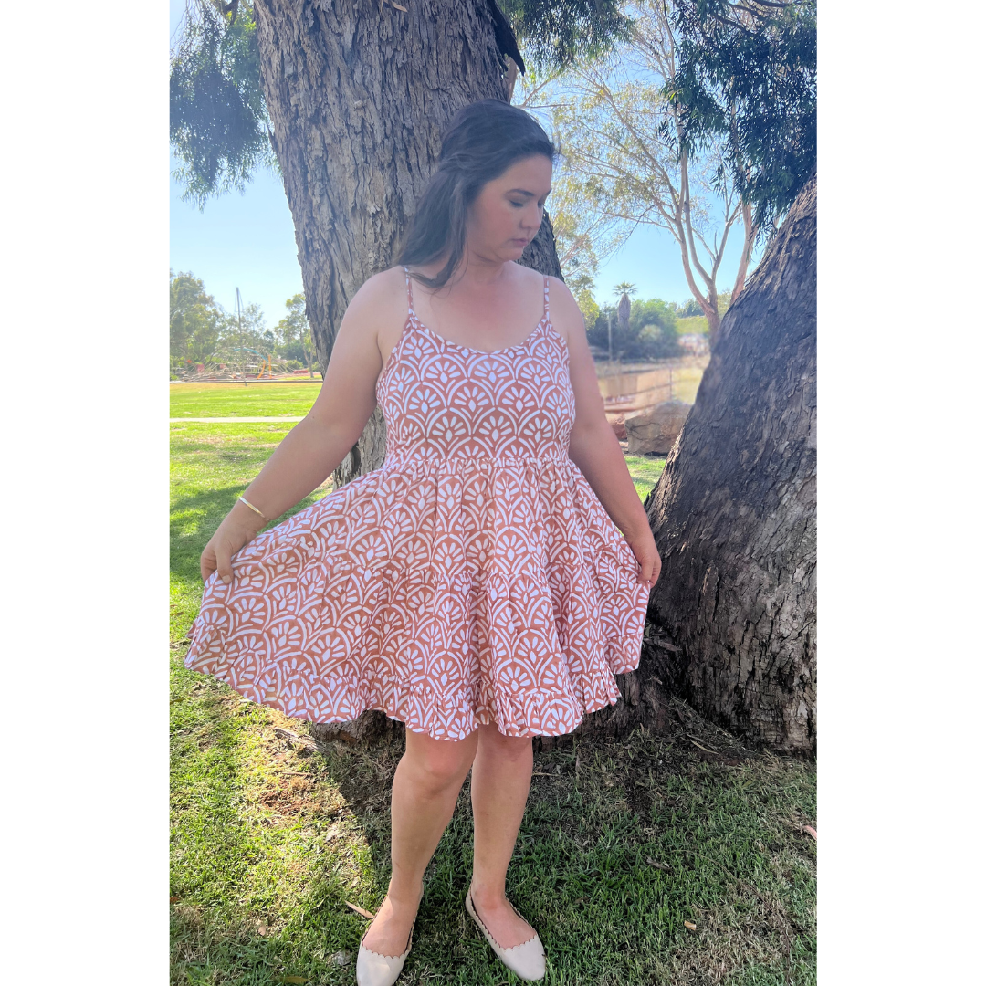This 100% cotton summer dress with adjustable straps ensures the perfect fit & breezy comfort. Shop your new go-to dress!