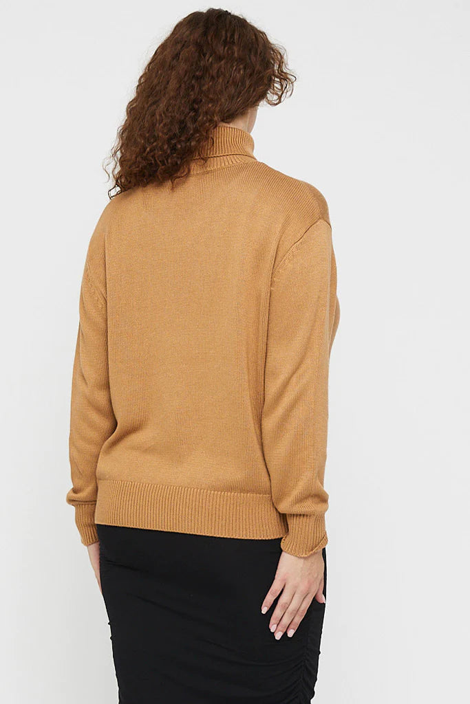 "Soft bamboo jumper for women: Turtle neck design provides warmth and elegance in sustainable fashion."