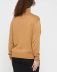 "Soft bamboo jumper for women: Turtle neck design provides warmth and elegance in sustainable fashion."