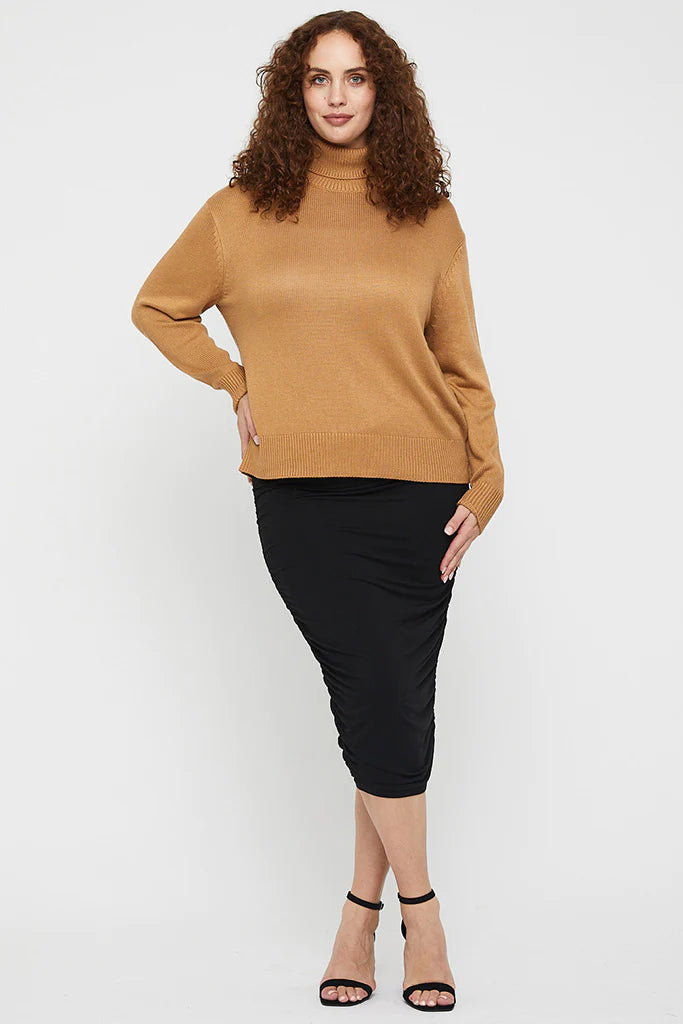 "Bamboo women's clothing: Turtle neck jumper offers eco-conscious style and comfort, perfect for chilly days."