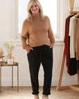 "Comfortable bamboo women's jumper: Turtle neck style offers warmth and sustainability in everyday wear."