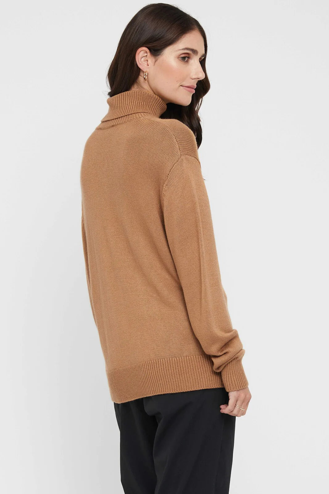 "Bamboo women's clothing: Stay cozy and eco-conscious with this turtle neck jumper, perfect for versatile styling."