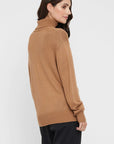 "Bamboo women's clothing: Stay cozy and eco-conscious with this turtle neck jumper, perfect for versatile styling."