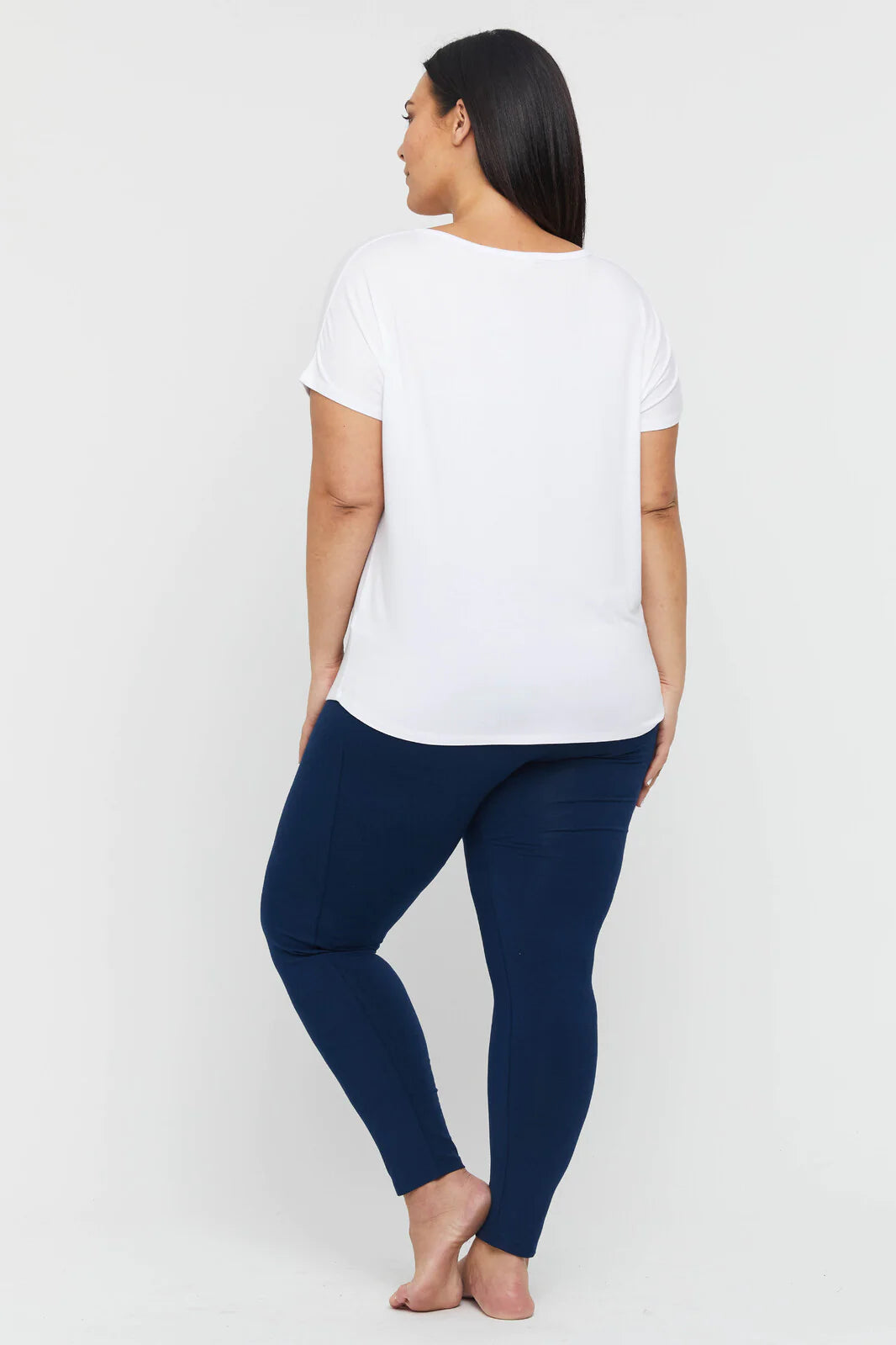 "Eco-friendly bamboo women's clothing: Navy leggings offer buttery softness and chic versatility."