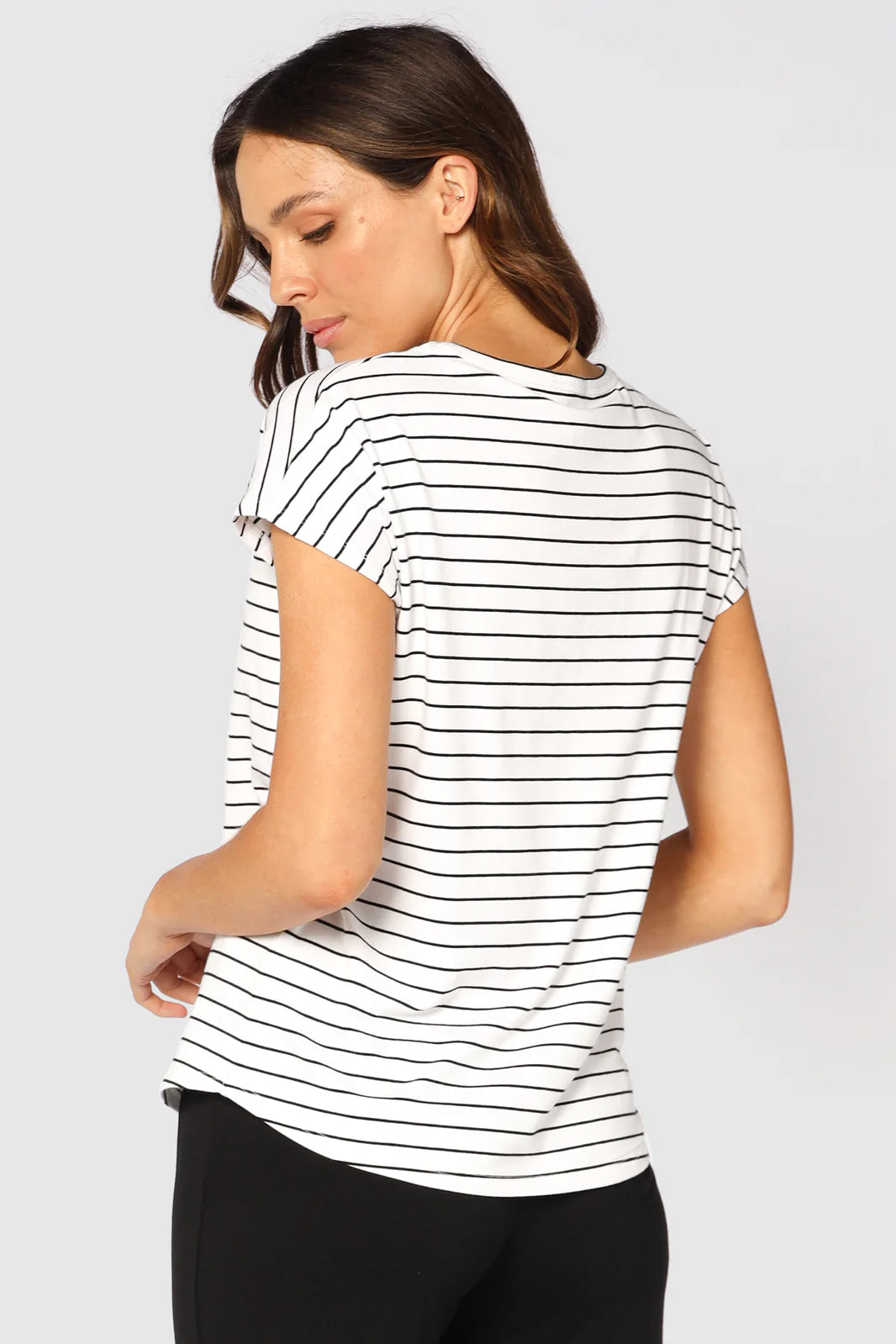 "Buttery soft bamboo women's top in stripe: Sustainable style with elegance and comfort in versatile attire."