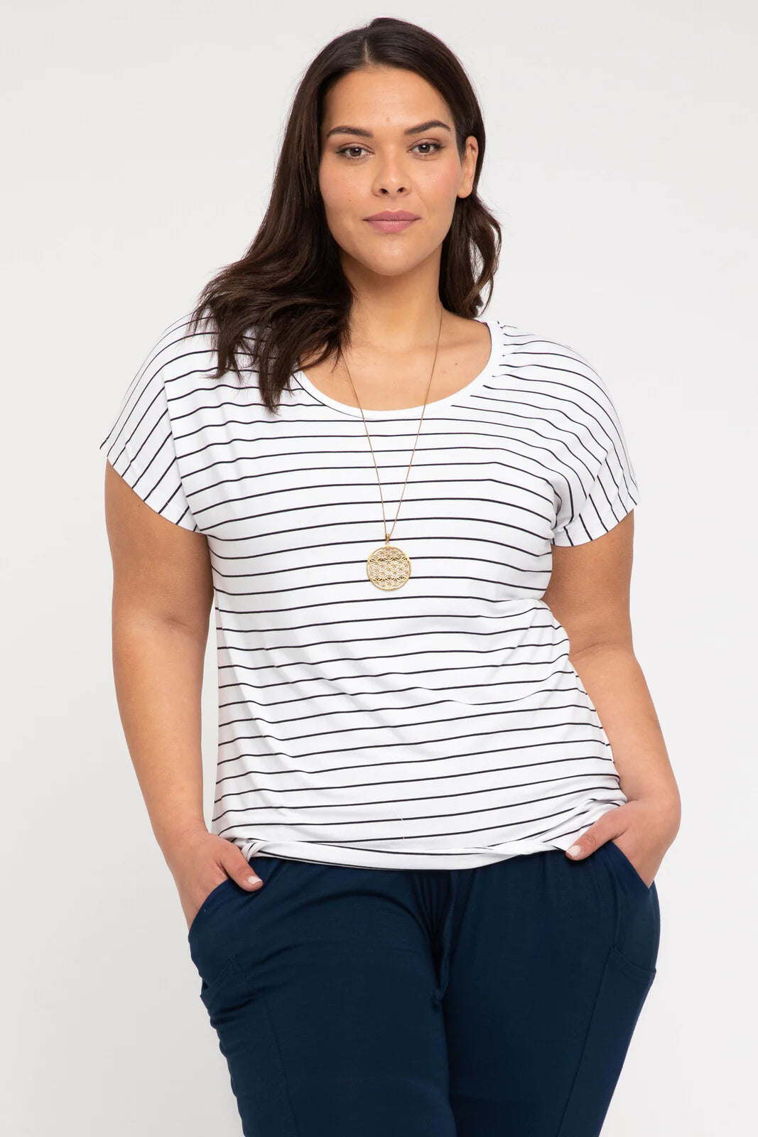 "Striped bamboo women's top: Luxuriously soft and eco-friendly, perfect for chic, sustainable fashion statements."