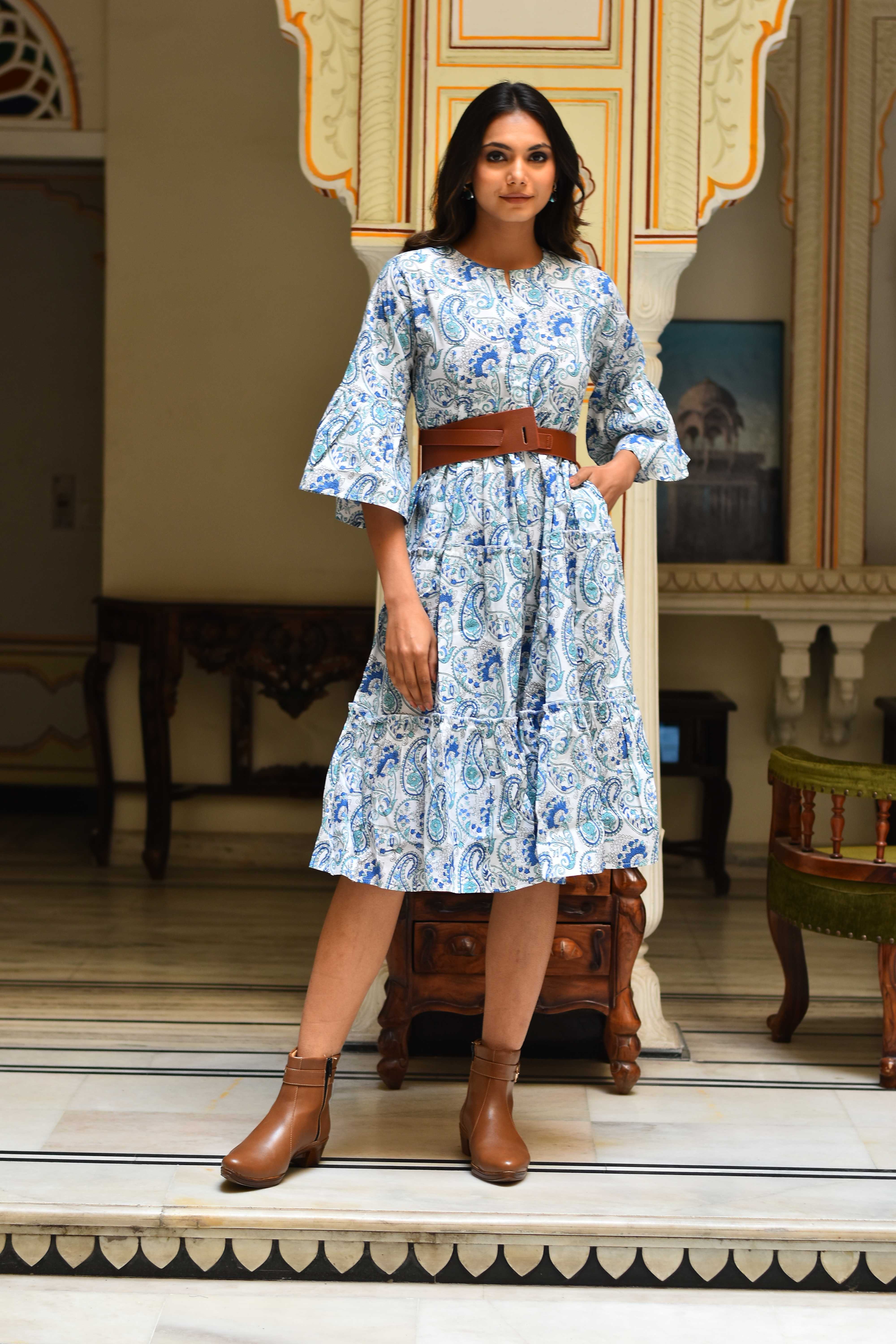 "Blue cotton midi dress: Elegant attire with long sleeves, perfect for any occasion."