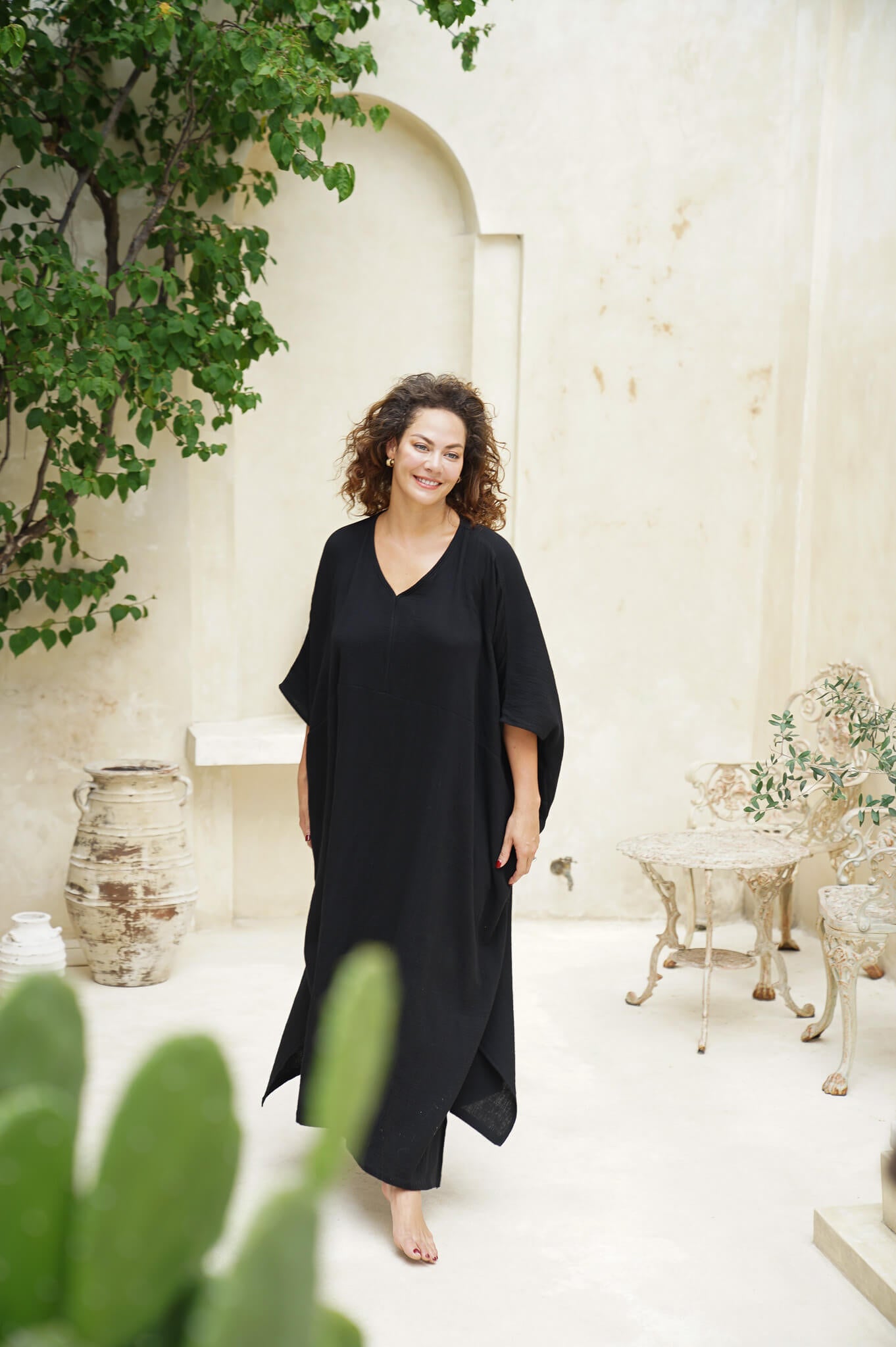Wrap yourself in luxury with our black cotton gauze sustainable kaftan dress. Unmatched style and comfort await!