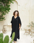 Wrap yourself in luxury with our black cotton gauze sustainable kaftan dress. Unmatched style and comfort await!