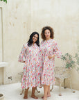Turn heads in our red floral midi dress! Luxurious cotton, stunning design. Unleash your elegance - order now!