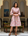 "Handmade long-sleeved cotton midi dress: Artisanal craftsmanship meets fashion-forward design."
