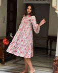 "Handmade cotton midi dress: Unique artisanal creation with long sleeves, perfect for chic style."