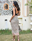 "Cotton sarongs: Wrap yourself in beachy charm, ideal for seaside adventures. Soft and breathable, perfect for coastal elegance."