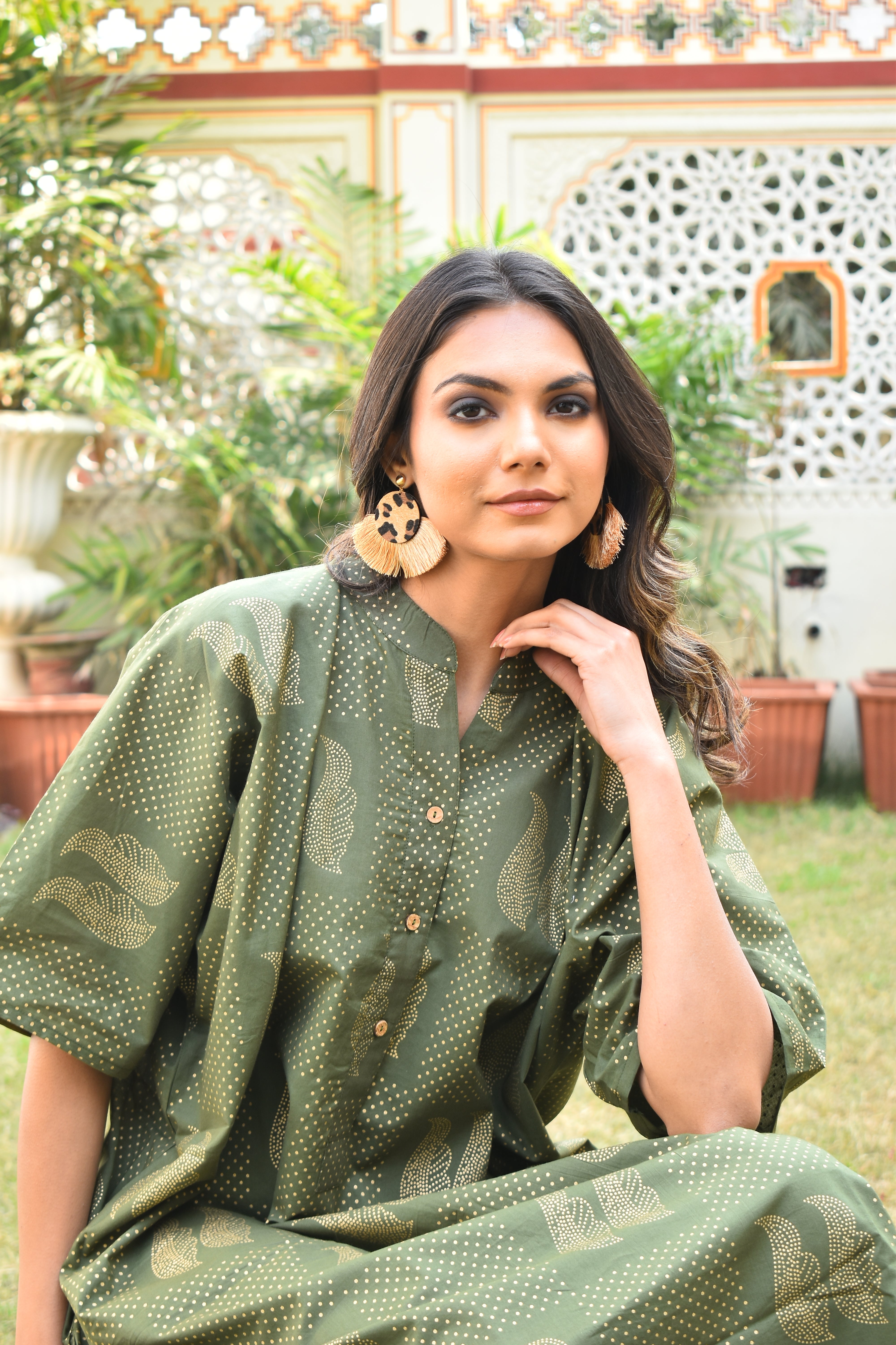 "Handmade shirt dress in cotton: Green and gold fusion, reflecting skilled craftsmanship and style."