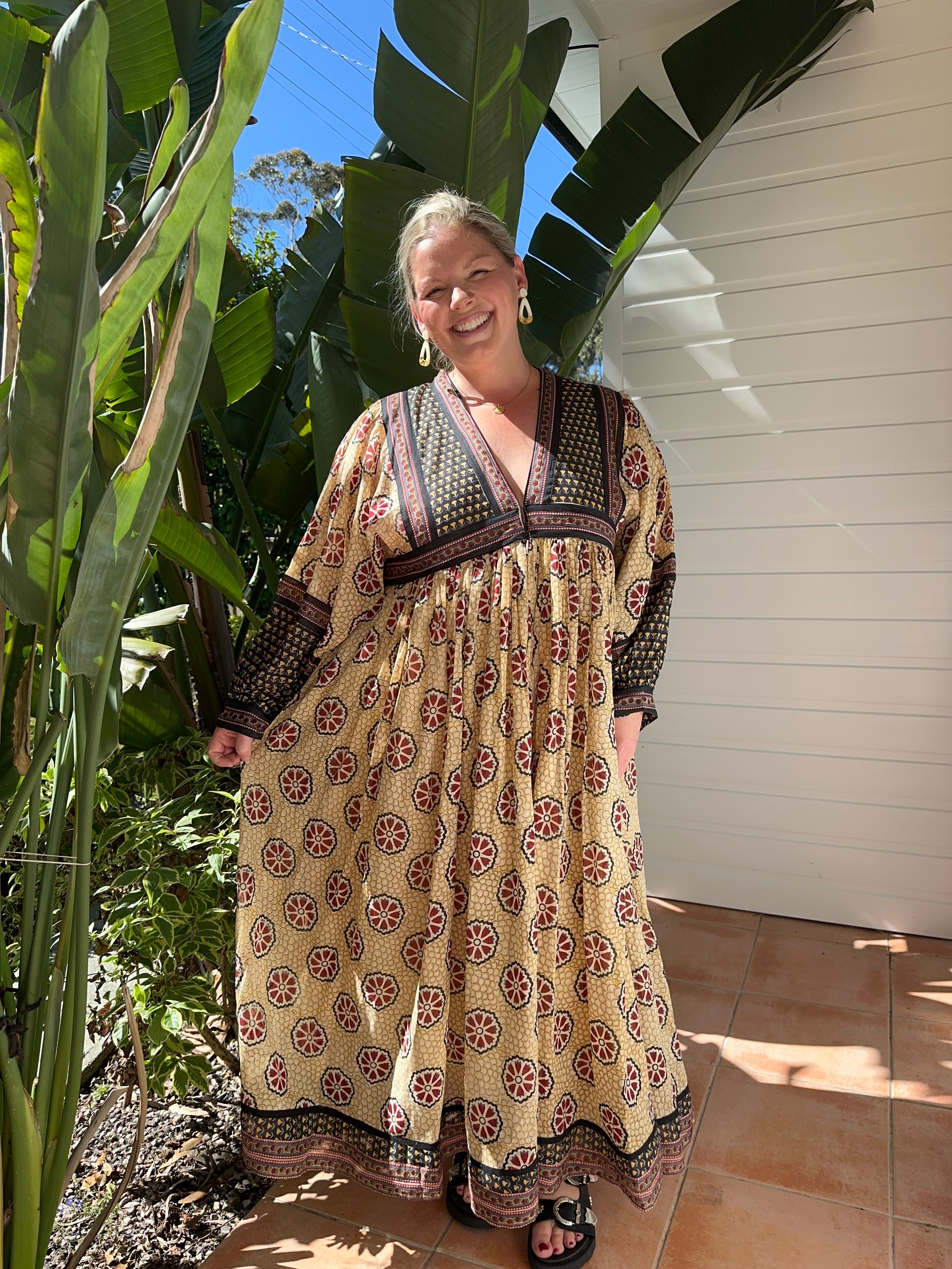 This cream cotton maxi dress with long sleeves is soft, breathable & flattering. Ethically made for effortless style. Buy today!