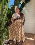This cream cotton maxi dress with long sleeves is soft, breathable & flattering. Ethically made for effortless style. Buy today!