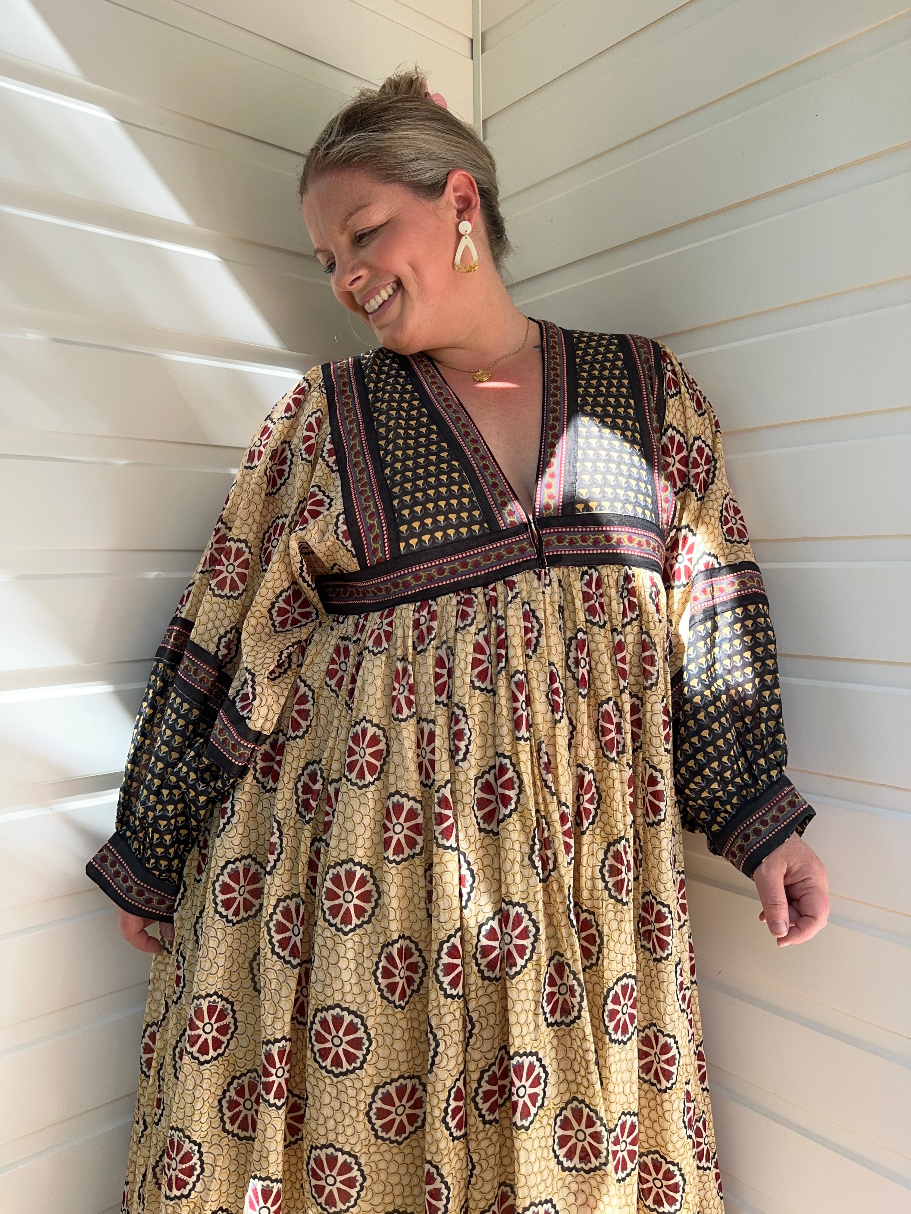 Our cream cotton maxi dress with long sleeves offers comfort, style & breathability. Perfect for any season. Shop now!