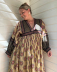 Our cream cotton maxi dress with long sleeves offers comfort, style & breathability. Perfect for any season. Shop now!