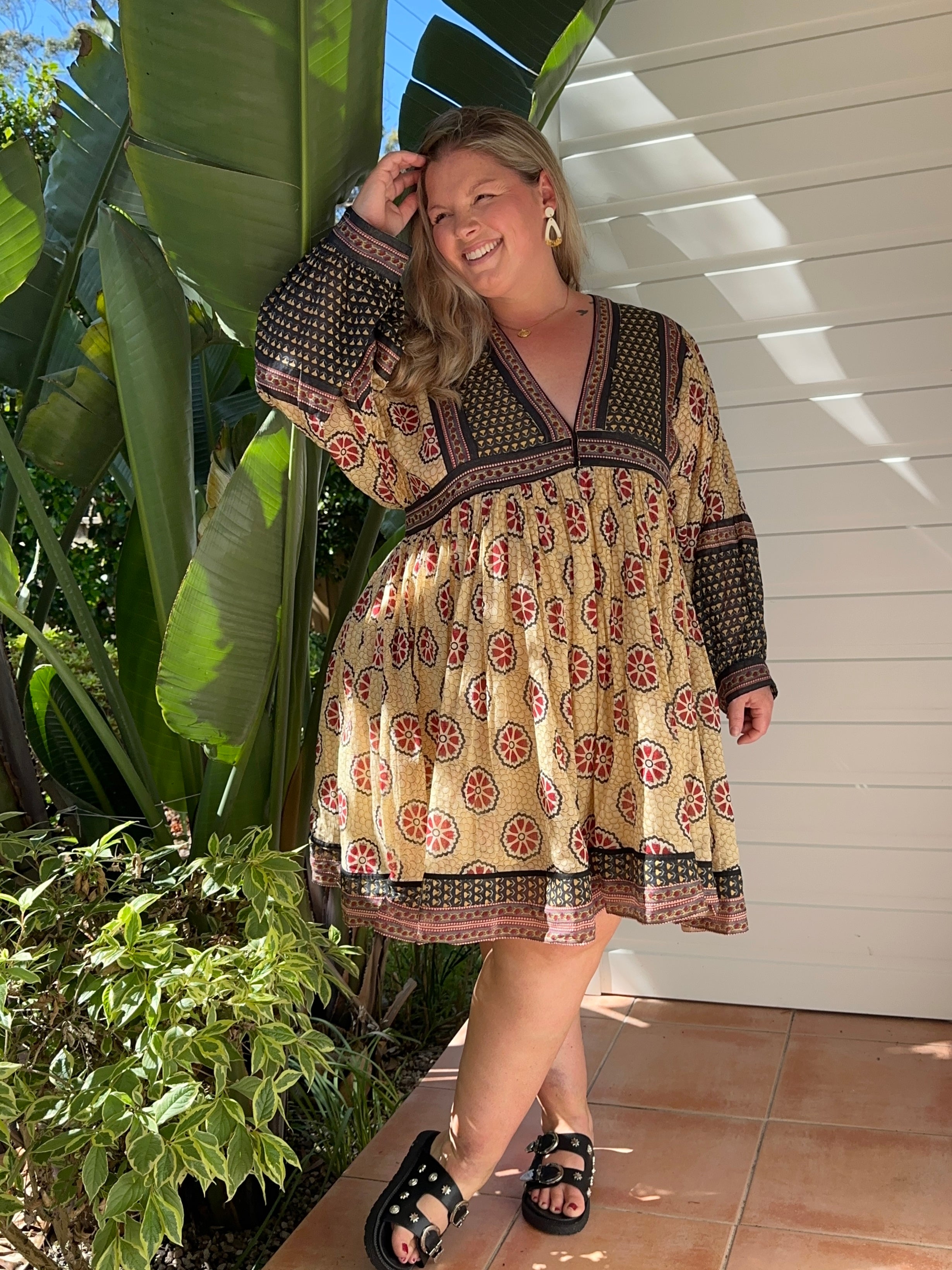 This cream cotton midi dress with long sleeves is your perfect wardrobe staple. Ethical, timeless & comfy—shop now!