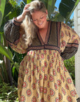 Our cream cotton midi dress with long sleeves is soft, breathable & eco-friendly. Feel good, look stunning!