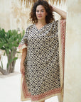 Elevate your style with our long kaftan in lattice print. Perfect for any occasion, this versatile piece offers comfort and elegance. Shop now!
