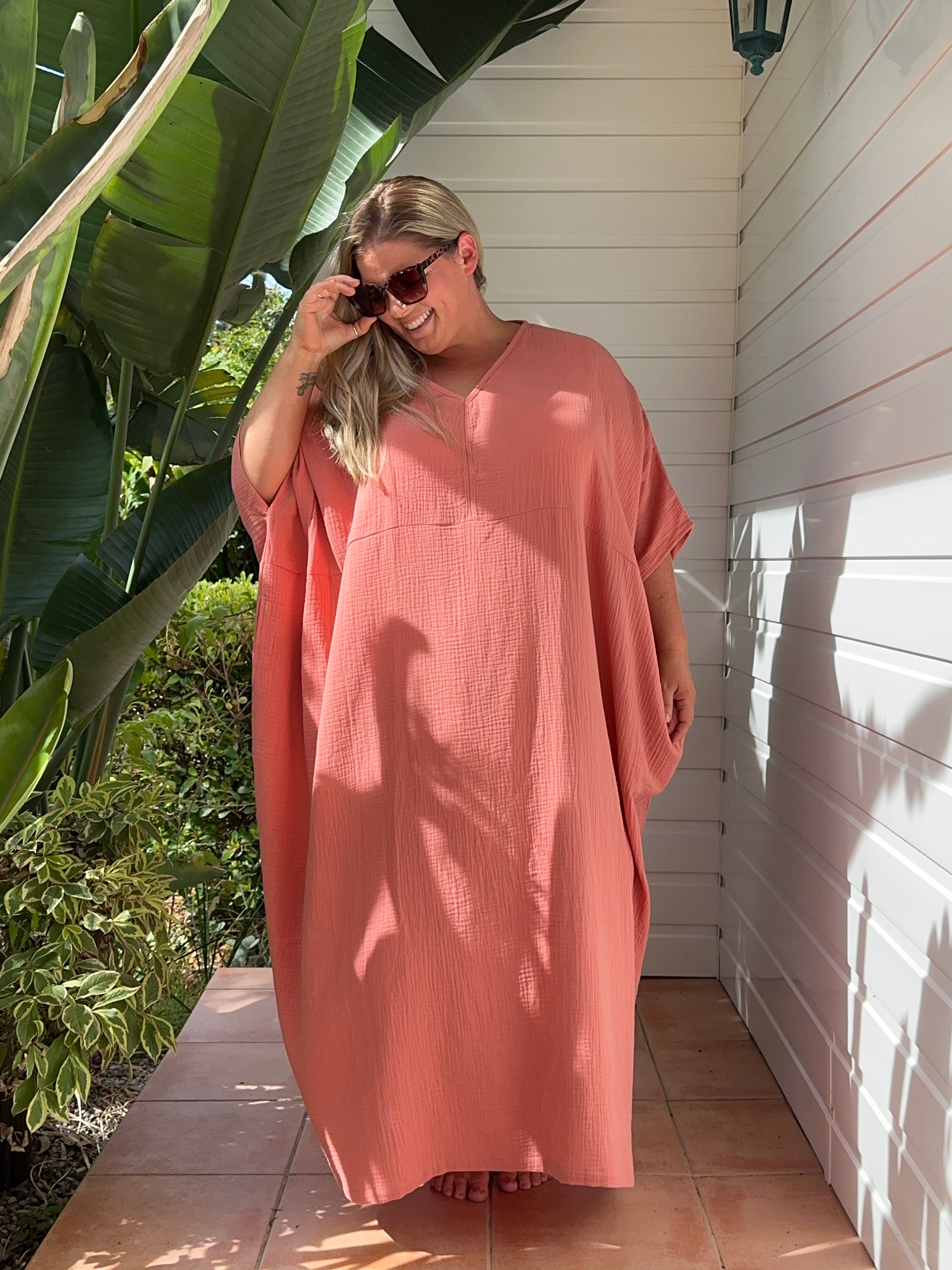Shop the light pink cotton kaftan, designed for relaxed elegance. Soft, breathable, and perfect for everyday wear. Comfort meets style.