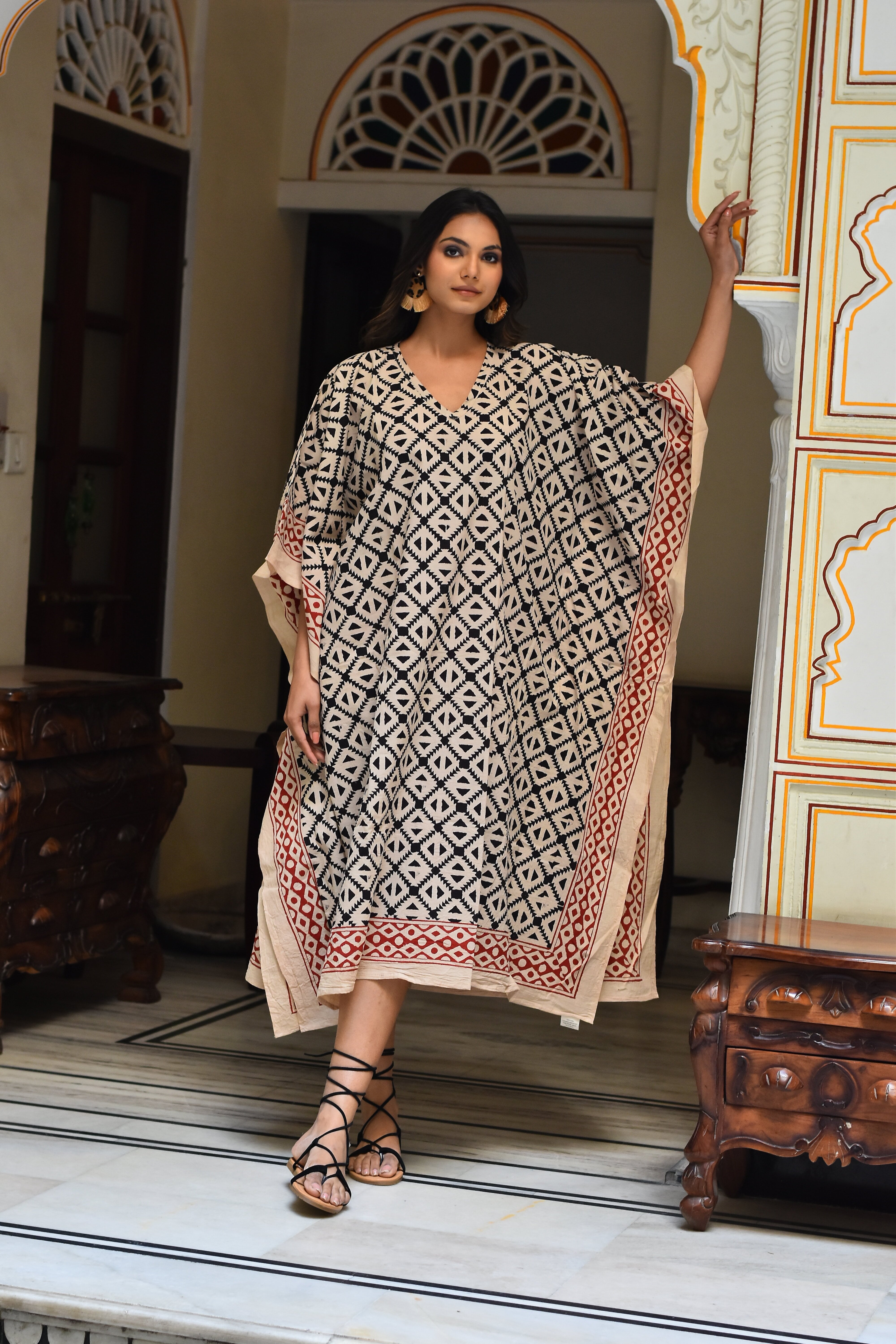 "Eco-conscious cotton kaftan: Long silhouette ensures eco-friendly elegance and comfort."