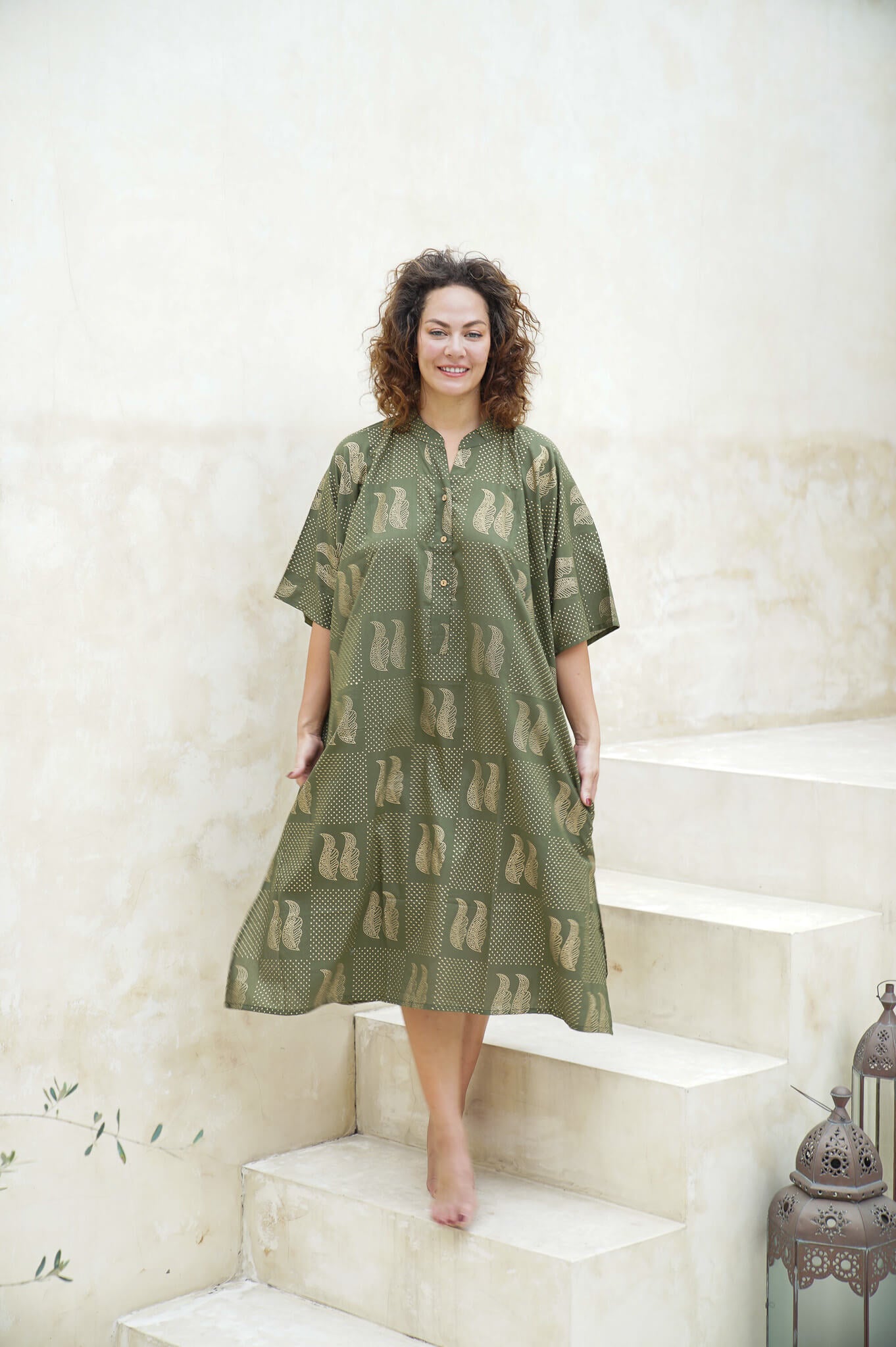 "Turn heads in our green long shirt dress. Versatile, comfortable, and oh-so-stylish. Get yours now!"