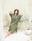 "Discover the allure of our green long shirt dress. Sophisticated, trendy, and always on point. Shop now!"