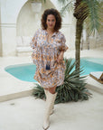 Wrap yourself in floral charm with our cotton midi dress. Experience effortless allure with every wear!