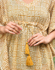 "Beach-ready cotton kaftan: Ideal cover-up for relaxed seaside vibes and effortless chic."