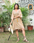 "Stylish cotton beach wrap: Short kaftan design, ensuring fashionable flair by the sea."