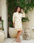 Capture the essence of summer in our yellow floral short dress. Stylish and irresistible!