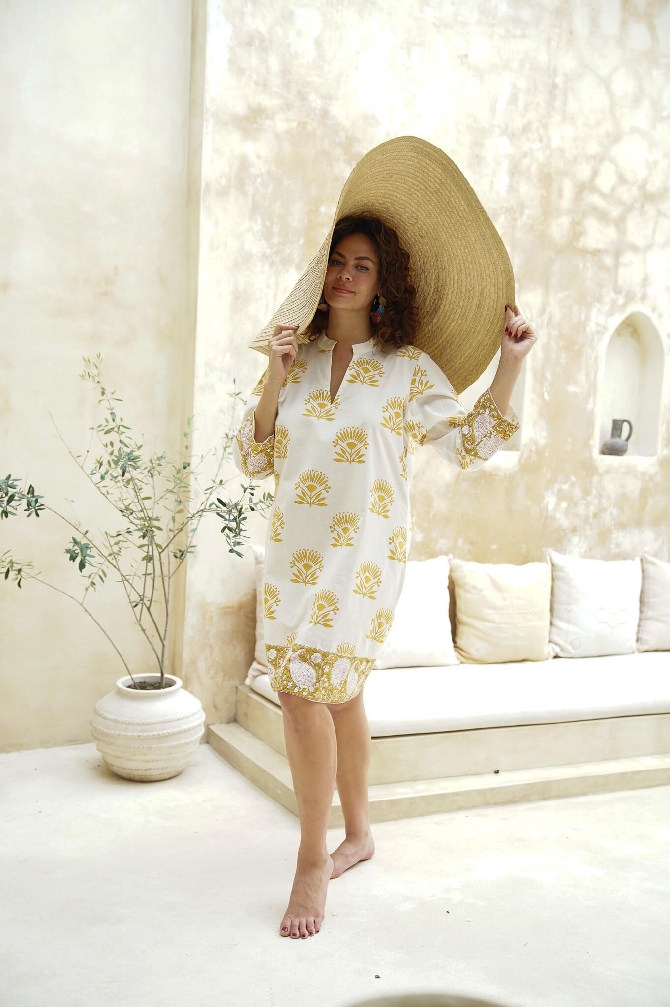 Floral long-sleeved cotton midi dress: Perfect blend of comfort and sophistication."