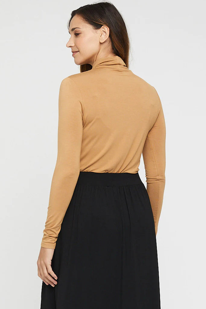 "skin-friendly bamboo women's clothing: Beige top offers luxurious comfort and stylish sophistication."