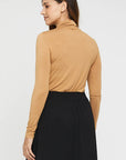 "skin-friendly bamboo women's clothing: Beige top offers luxurious comfort and stylish sophistication."