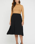 "Beige bamboo women's turtle neck top: Experience buttery softness and eco-friendly style in this versatile garment."
