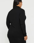 "Black turtle neck bamboo women's top: Luxuriously soft and eco-friendly, perfect for chic comfort."