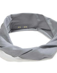 "Feel grounded and chic in our organic twist headband. Elevate your look effortlessly. Order yours today!"