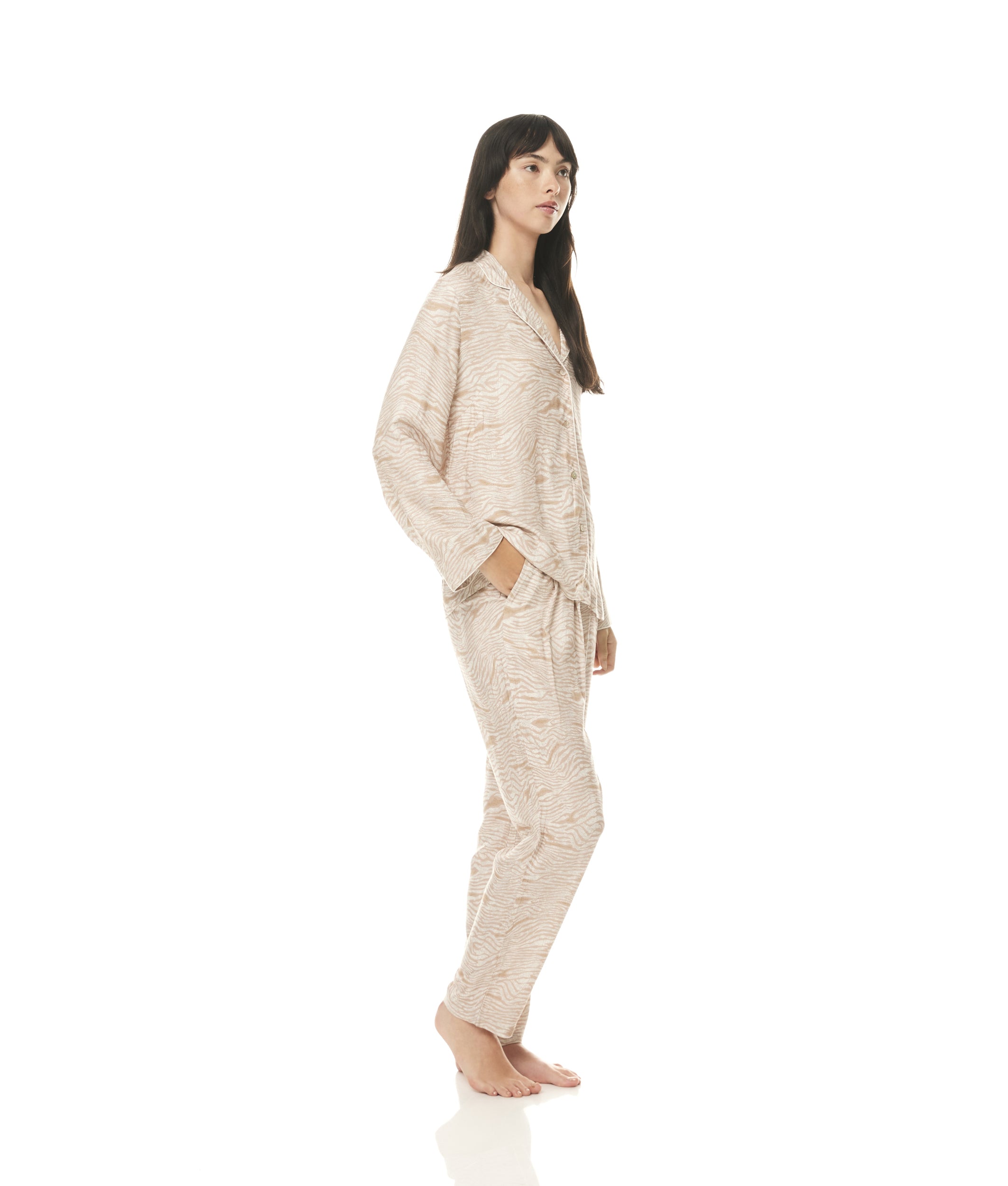 Eco-friendly bamboo pajamas in trendy prints. Enjoy ultimate comfort and breathability. Perfect for a cool, restful night's sleep. Order now!