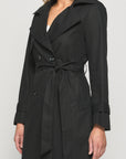 Discover the ultimate black trench coat – elegant, versatile, and perfect for any season. Upgrade your wardrobe with this timeless piece.